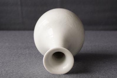 A Chinese blanc de Chine bottle vase with incised anhua design, ca. 1900