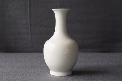 A Chinese blanc de Chine bottle vase with incised anhua design, ca. 1900