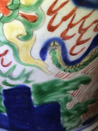 A pair of Chinese wucai &lsquo;dragon and phoenix&rsquo; vases, Transitional period