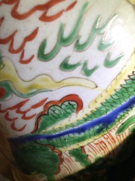 A pair of Chinese wucai &lsquo;dragon and phoenix&rsquo; vases, Transitional period