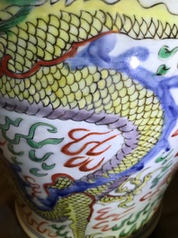 A pair of Chinese wucai &lsquo;dragon and phoenix&rsquo; vases, Transitional period