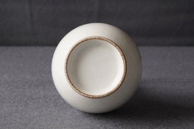 A Chinese blanc de Chine bottle vase with incised anhua design, ca. 1900