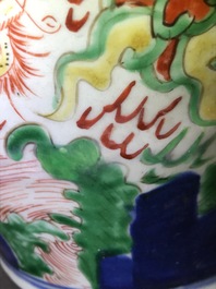 A pair of Chinese wucai &lsquo;dragon and phoenix&rsquo; vases, Transitional period
