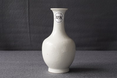 A Chinese blanc de Chine bottle vase with incised anhua design, ca. 1900