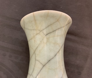 A Chinese celadon crackle-glazed vase and a famille verte vase, 19th C.