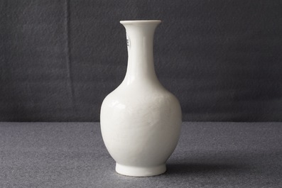 A Chinese blanc de Chine bottle vase with incised anhua design, ca. 1900