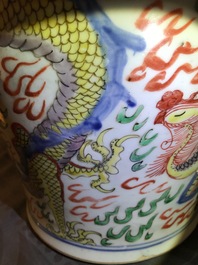 A pair of Chinese wucai &lsquo;dragon and phoenix&rsquo; vases, Transitional period