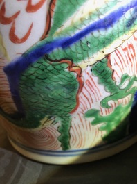 A pair of Chinese wucai &lsquo;dragon and phoenix&rsquo; vases, Transitional period