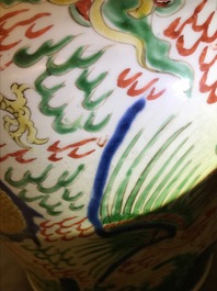 A pair of Chinese wucai &lsquo;dragon and phoenix&rsquo; vases, Transitional period