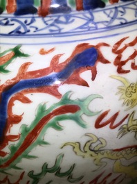A pair of Chinese wucai &lsquo;dragon and phoenix&rsquo; vases, Transitional period