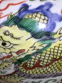 A pair of Chinese wucai &lsquo;dragon and phoenix&rsquo; vases, Transitional period