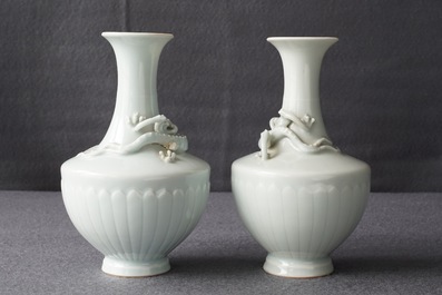A pair of Chinese ru-style glazed vases with applied qilong, Yongle mark, 19th C.