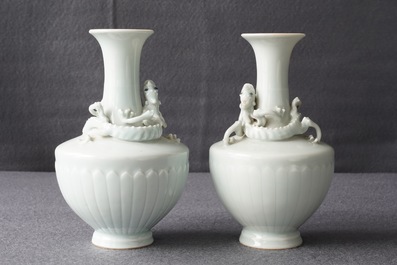 A pair of Chinese ru-style glazed vases with applied qilong, Yongle mark, 19th C.