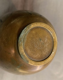 A Japanese inlaid bronze vase, a bronze censer and a parcel-gilt copper brush pot, Meiji, 19th C.