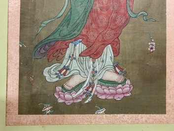 Chinese school: The goddess Guanyin standing, ink and colour on paper, 18/19th C.