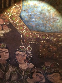 A Qajar arch-shaped oil on canvas: Zulaikha's servants cutting their hands as Yusuf appears, Qajar, 19th C.