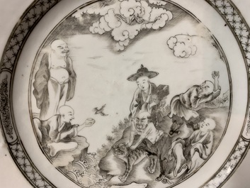A Chinese grisaille 'immortals and tiger' plate and a pair of 'jesuit' cups and saucers, Qianlong