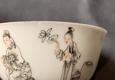 A pair of Chinese grisaille and gilt cups and saucers, Qianlong