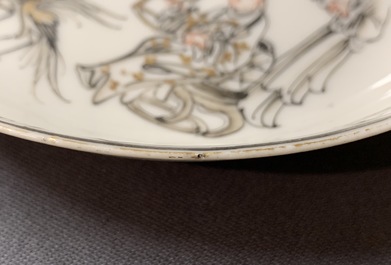 A pair of Chinese grisaille and gilt cups and saucers, Qianlong