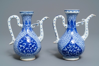 A pair of Chinese blue and white Islamic market jugs, Kangxi