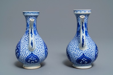 A pair of Chinese blue and white Islamic market jugs, Kangxi