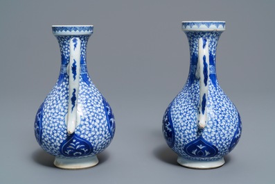 A pair of Chinese blue and white Islamic market jugs, Kangxi
