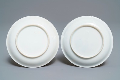 A pair of Chinese famille rose 'roosters' cups and saucers, Yongzheng/Qianlong
