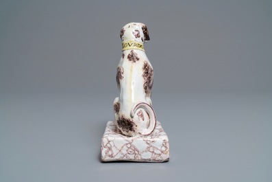 A manganese and yellow Brussels faience model of a dog, 18th C.