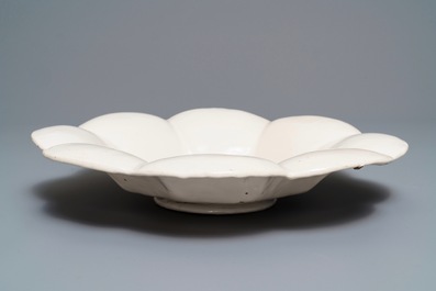 A large white Dutch Delft gadrooned dish, 17th C.