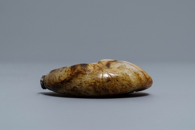 A Chinese greyish-white and russet jade snuff bottle, 19/20th C.