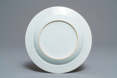 A fine Chinese famille rose plate with ladies in a garden, Yongzheng