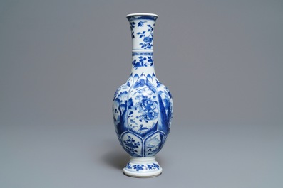 A Chinese blue and white bottle vase with horseriders and landscapes, Kangxi