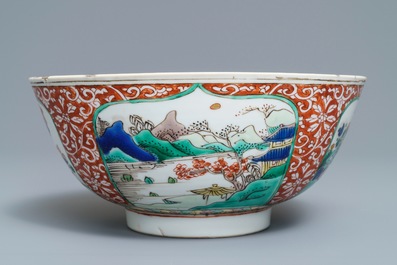 A Chinese famille verte plaque with playing boys and a landscape bowl, Kangxi