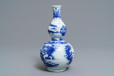 A Chinese blue and white double gourd vase, Transitional period