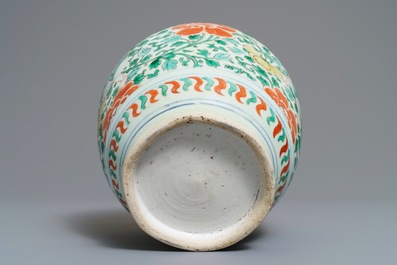 A Chinese wucai jar with boys among peonies, Transitional period