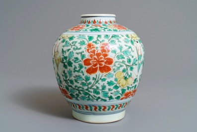 A Chinese wucai jar with boys among peonies, Transitional period