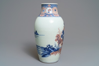 A Chinese blue, white and underglaze red landscape vase, 19th C.