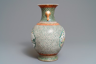 A Chinese famille rose elephant-handle hu vase, Wanli mark, 19th C.