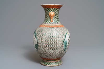A Chinese famille rose elephant-handle hu vase, Wanli mark, 19th C.