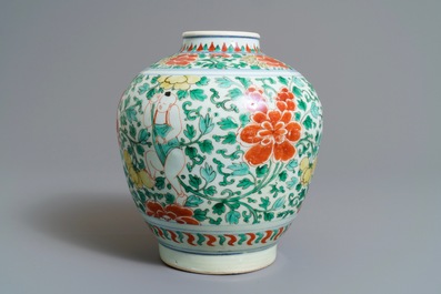 A Chinese wucai jar with boys among peonies, Transitional period