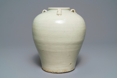 An incised Chinese celadon-glazed Swatow vase, Ming