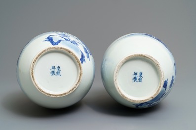 A pair of Chinese blue and white bottle vases, Kangxi mark, 19th C.