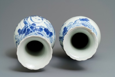 A pair of Chinese blue and white bottle vases, Kangxi mark, 19th C.