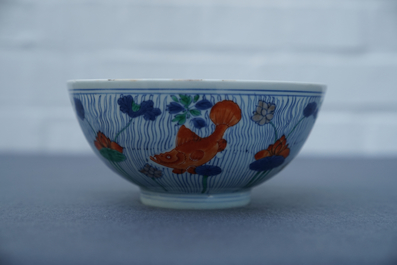 A Chinese doucai bowl with fish in a lotus pond, Xuande mark, Kangxi