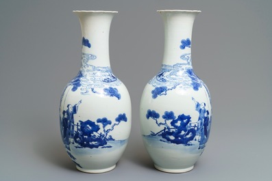 A pair of Chinese blue and white bottle vases, Kangxi mark, 19th C.