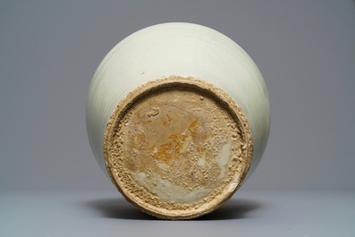 An incised Chinese celadon-glazed Swatow vase, Ming