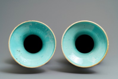 A pair of Chinese famille rose 'immortals' vases, 19th C.