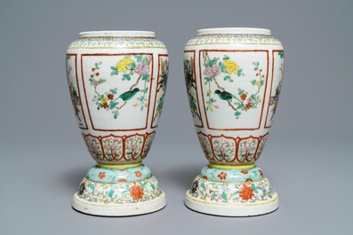 A pair of Chinese famille verte urns, 19th C.