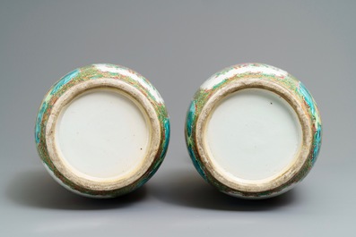 A pair of Chinese Canton famille rose vases, 19th C.