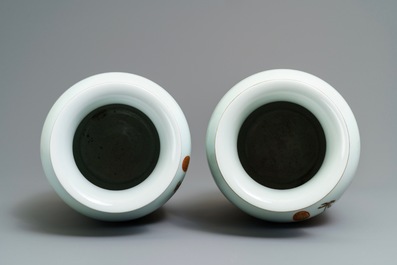 A pair of Chinese iron red, grisaille and gilt vases, Qianlong mark, 20th C.